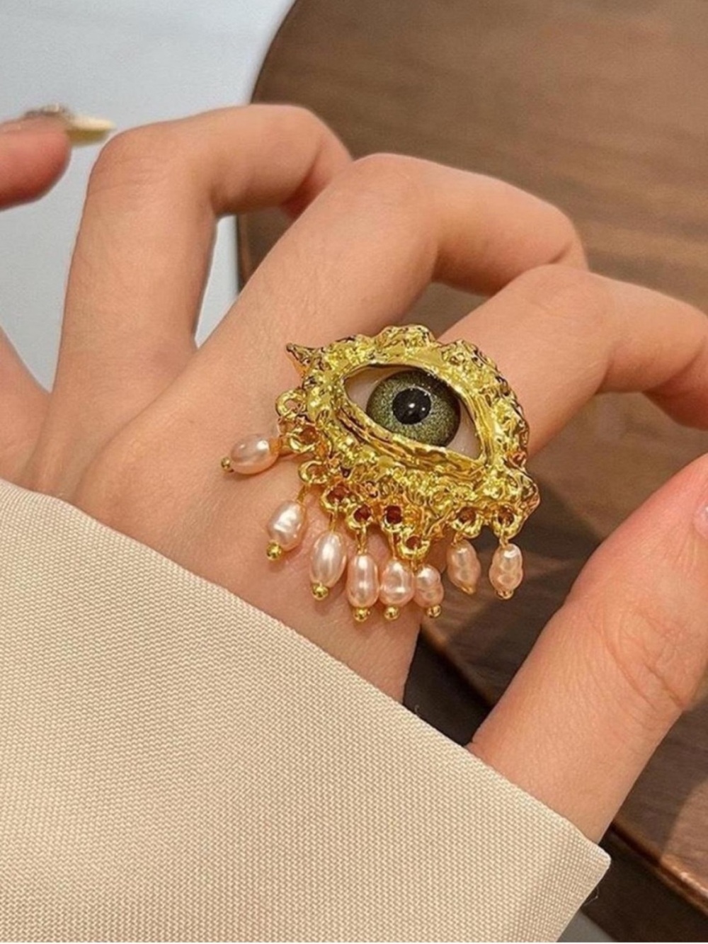 Schiaparelli Gold Eye Statement Ring with Pearl Drops